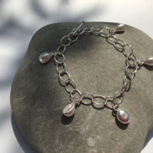 crystal-johnson-29.-multiple-cowrie-and-pebble-charm-bracelet-180-2