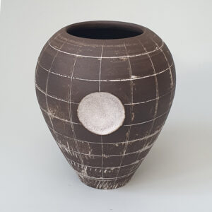 Emily Myers 23. Mini black globe vase