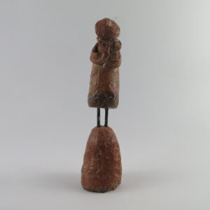 Figure holding an Owl