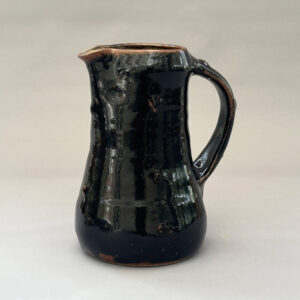 Peter Swanson 10. Tenmoku-glazed Jug with chestnut ash inside